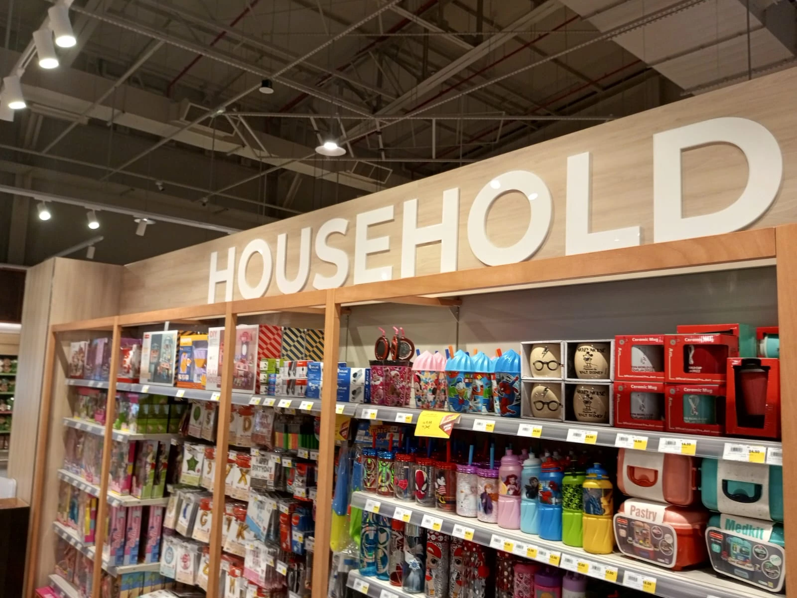 Store wayfinding — Supermarket department signs, aisle markers and self-checkout signage